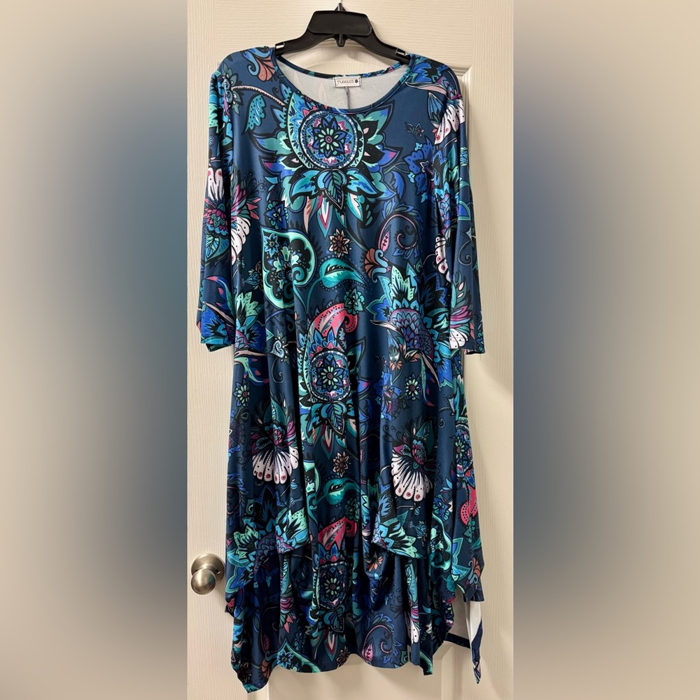 Nuggles dress with fun peacock print